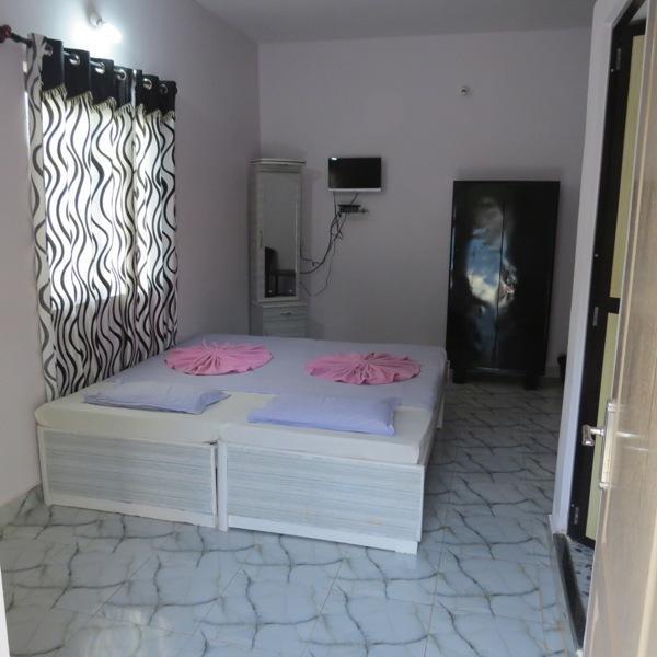 Casa Almeida Guest House Candolim Quarto foto
