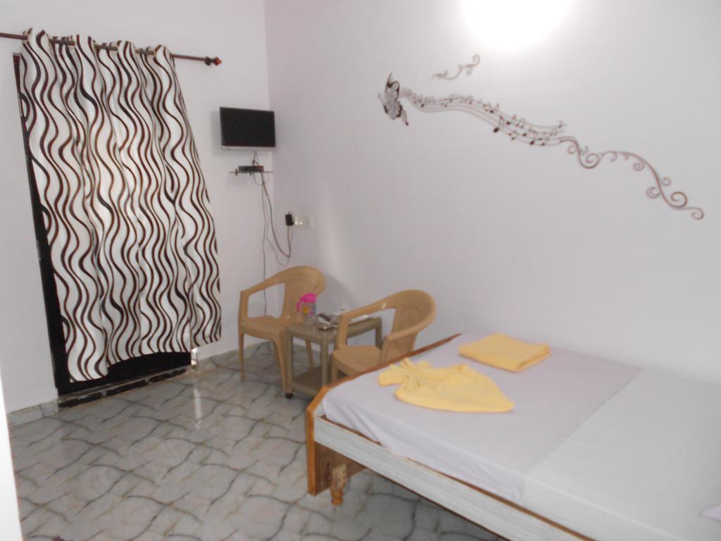 Casa Almeida Guest House Candolim Quarto foto