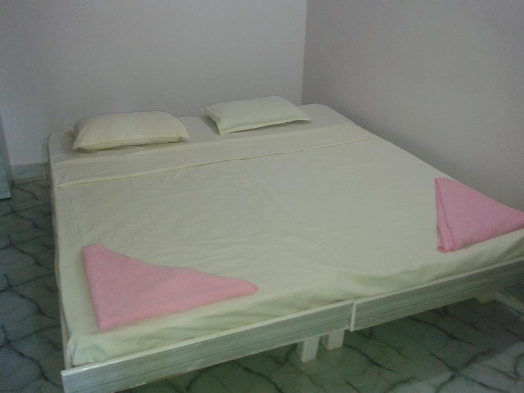 Casa Almeida Guest House Candolim Quarto foto